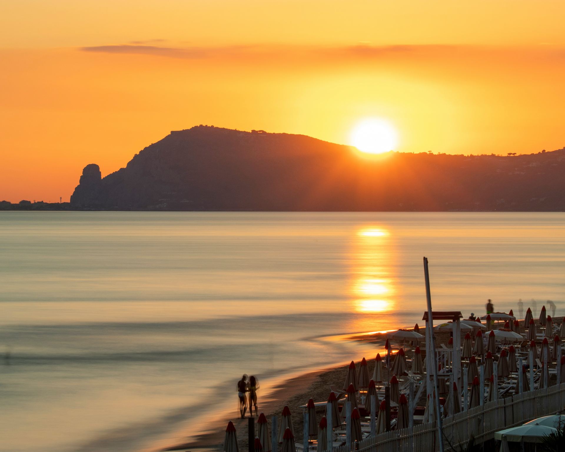 Golden sunset on Sperlonga beach with its calm and crystal-clear waters